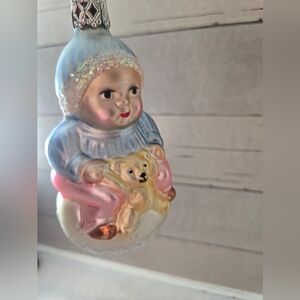 Vintage German Blown Glass Christmas Ornament. Baby on snowball with teddy bear